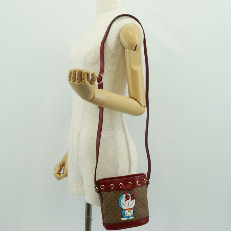 【日本直送】GUCCI 哆啦A夢迷你GG Supreme單肩包 PVC 米色 金色 647801 正品 168092M-23
