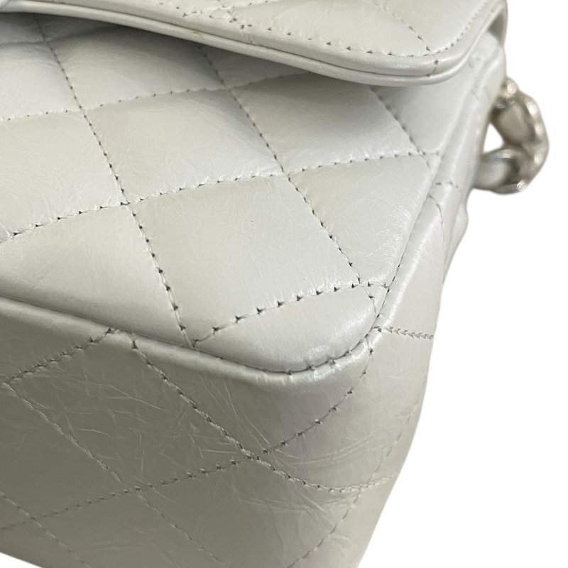 CHANEL 香奈兒 A69900 CF 20 爆裂紋珠光口蓋包 皮革 珍珠白 銀釦-7