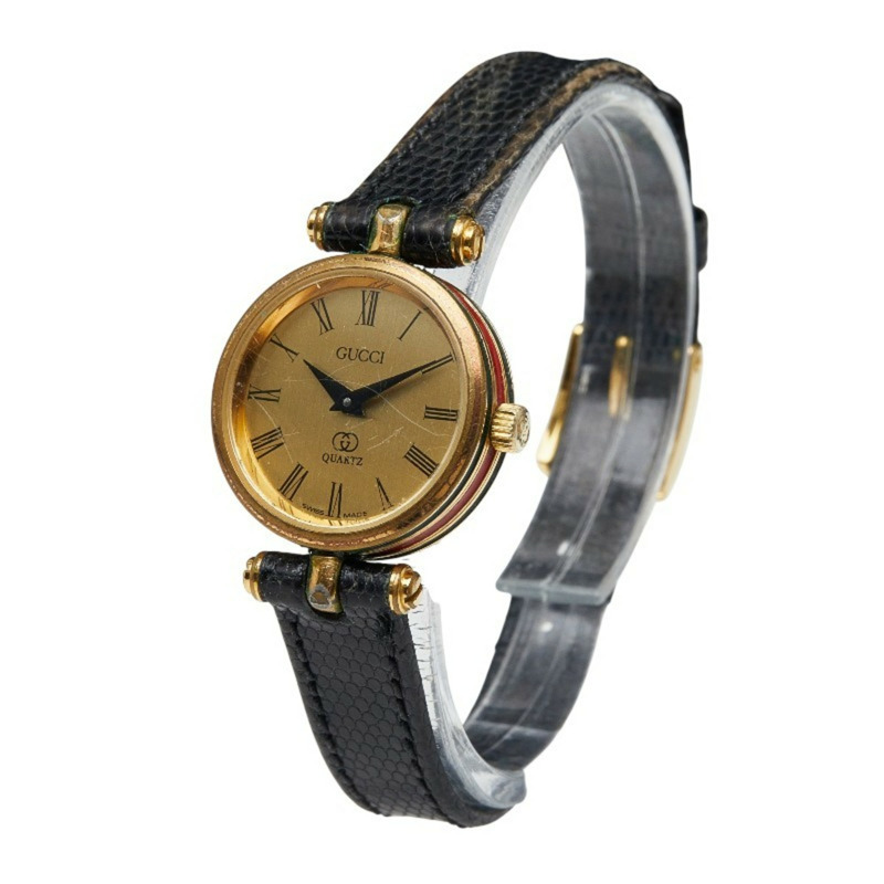 Gucci Sherry 系列石英腕錶，金色錶盤，不鏽鋼錶殼搭配皮革錶帶，女款-1