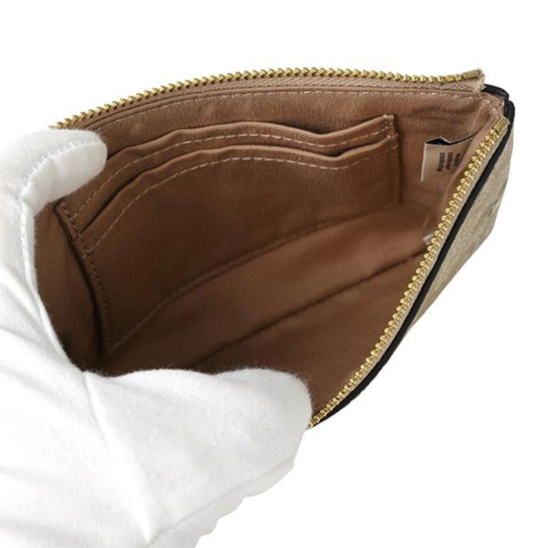 【COACH】印花皮革手拿包-卡其花朵-3