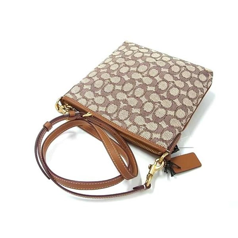 【COACH】滿版LOGO迪士尼聯名斜背方包-米奇緹花-2