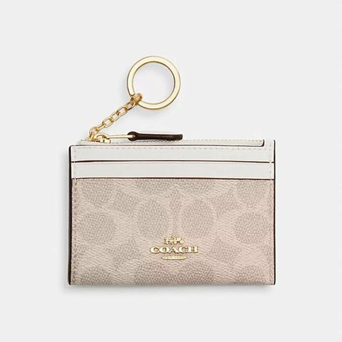 【COACH】滿版LOGO拼接皮革卡片零錢包-卡其白