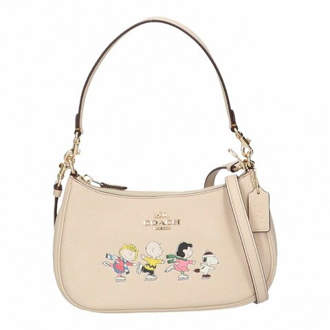 【COACH】史努比聯名款皮革肩斜背兩用彎月包-米白