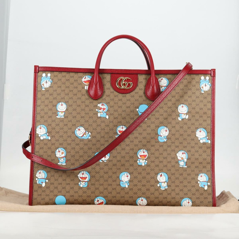 【日本直送】GUCCI Micro GG Supreme哆啦A夢手提包 PVC材質 兩用 棕金色 653952 正品 131782SAM-11