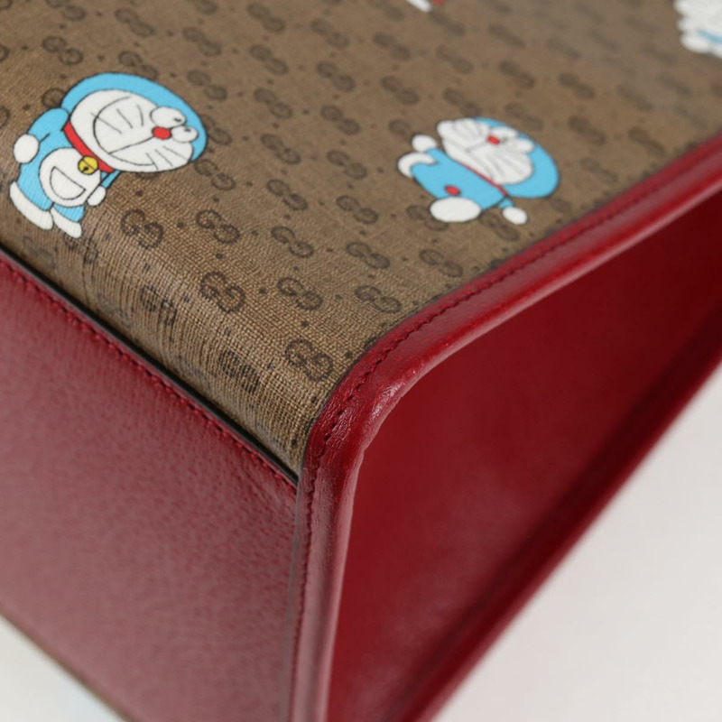 【日本直送】GUCCI Micro GG Supreme哆啦A夢手提包 PVC材質 兩用 棕金色 653952 正品 131782SAM-15