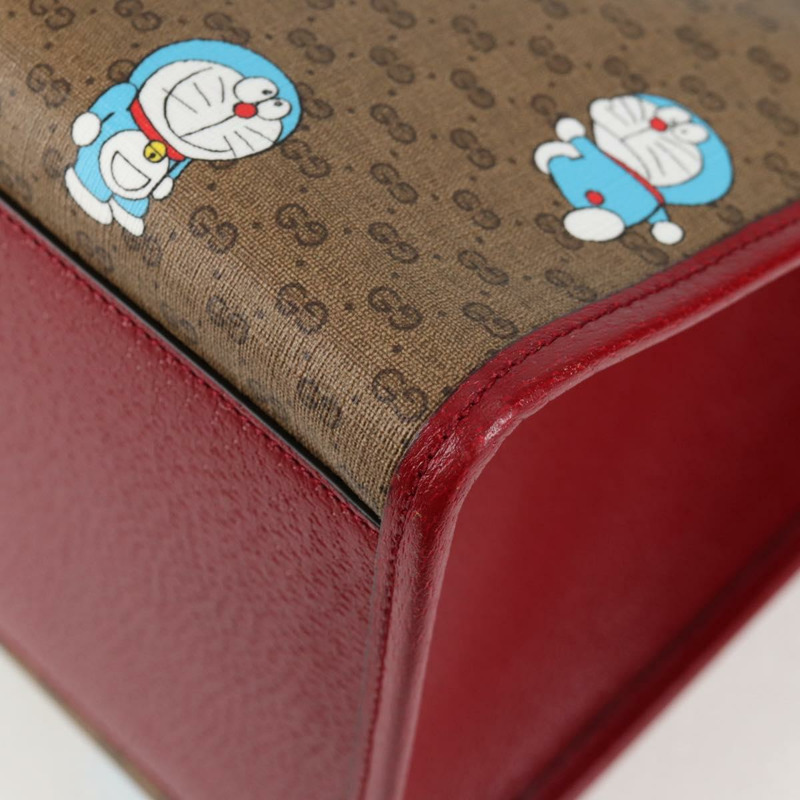 【日本直送】GUCCI Micro GG Supreme哆啦A夢手提包 PVC材質 兩用 棕金色 653952 正品 131782SAM-17
