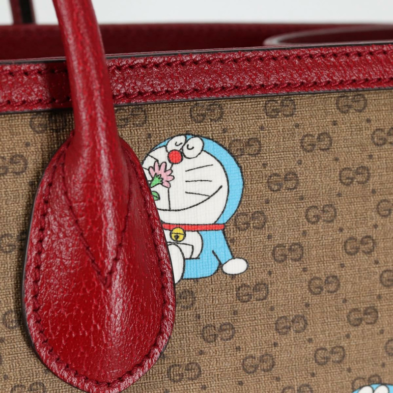 【日本直送】GUCCI Micro GG Supreme哆啦A夢手提包 PVC材質 兩用 棕金色 653952 正品 131782SAM-18