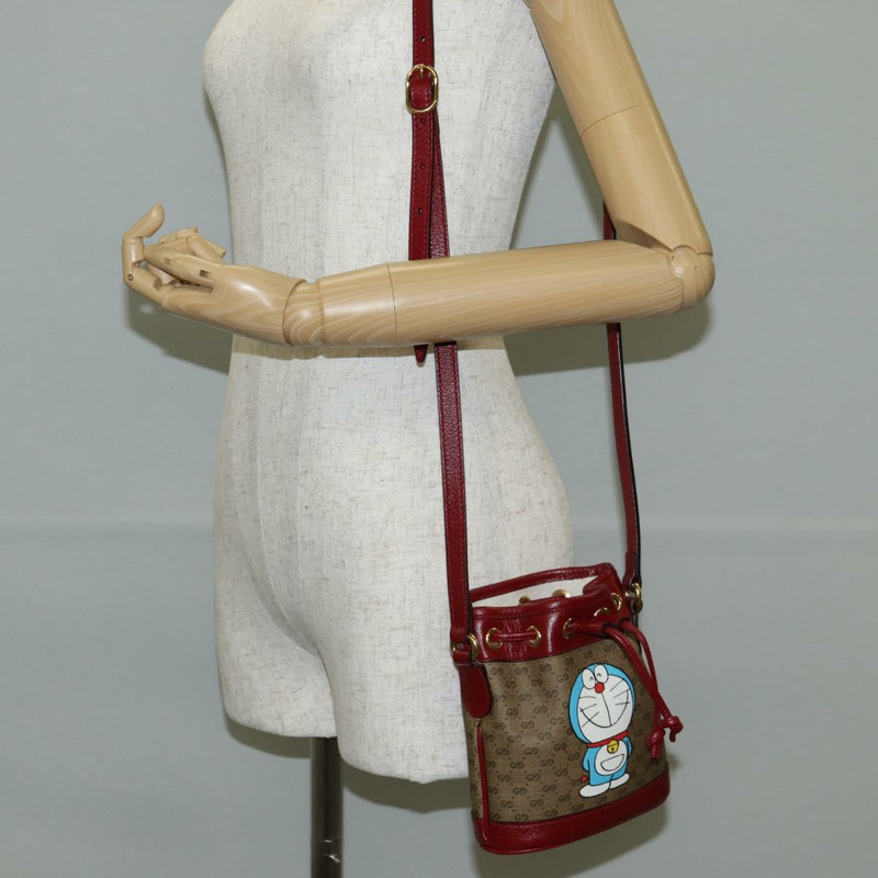 【日本直送】GUCCI Micro GG Supreme哆啦A夢聯名手提包 PVC 米色 647801 正品 135552SAM-20
