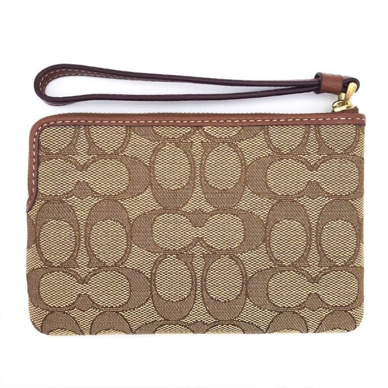 【COACH】印花防刮PVC皮革L型拉鍊手拿包-迪士尼-2