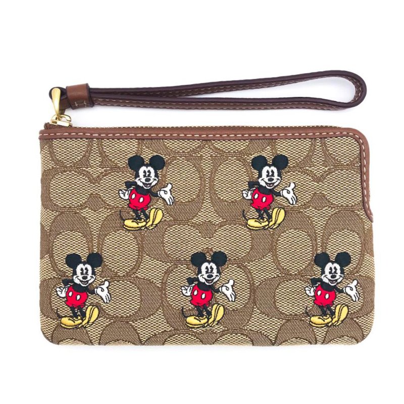 【COACH】印花防刮PVC皮革L型拉鍊手拿包-迪士尼-4