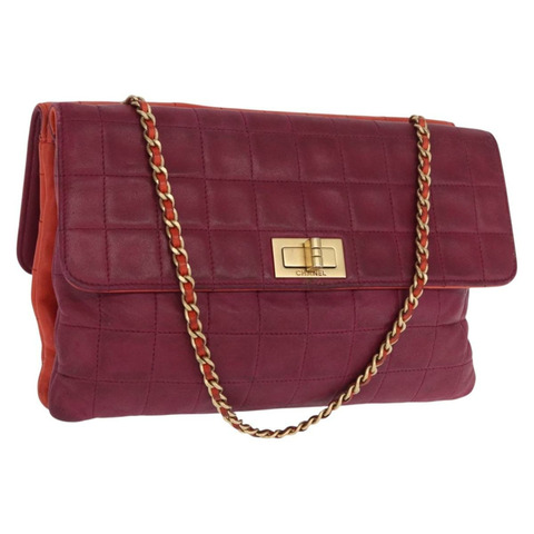 香奈兒 Choco Bar 手提包，羊皮材質，橙色金色 CC 標誌，型號 bs33102