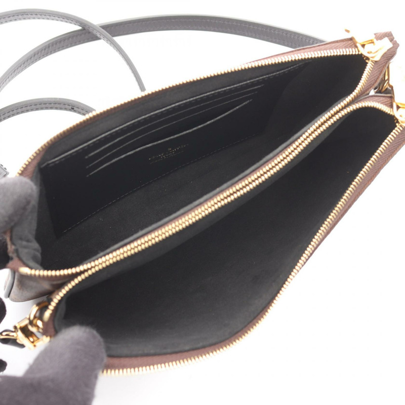 路易威登 Pochette 雙拉鍊肩背包 M69203 Monogram Giant Reverse-2