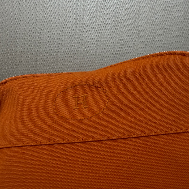 Hermes 橙色帆布銀釦收納化妝包-1