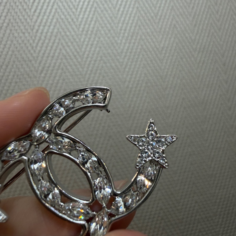 Chanel 銀色星星水鑽簍空胸針AB3611-2