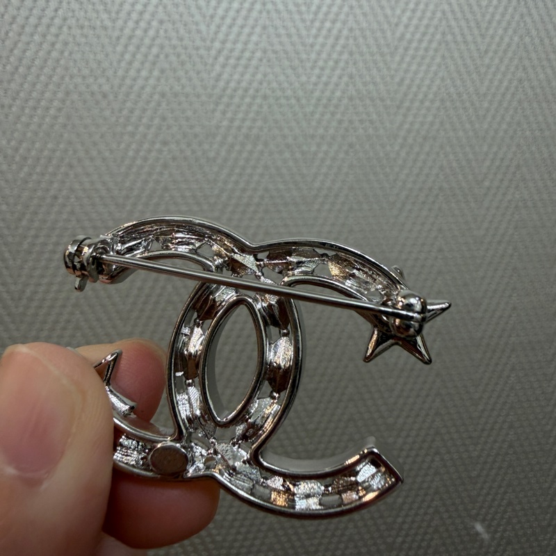 Chanel 銀色星星水鑽簍空胸針AB3611-7