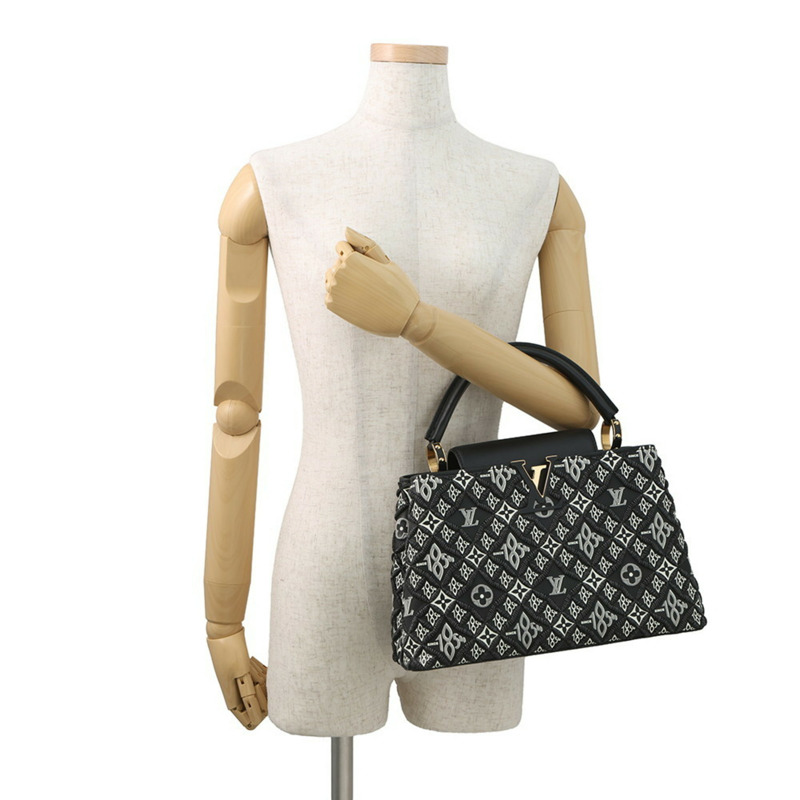 路易威登（Louis Vuitton）Capucines MM M57358 手袋，黑色，小牛皮材質，始於1854年。-3