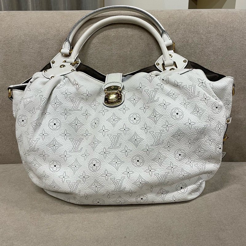 路易威登/Louis Vuitton 月光女神鏤空手提包-0
