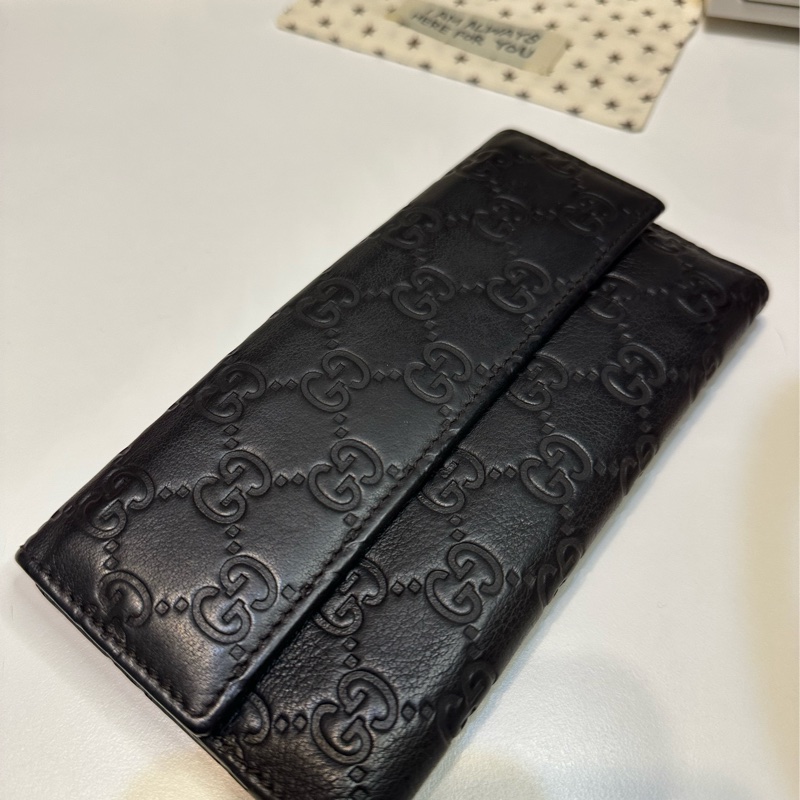 Gucci 滿版經典壓印黑色長夾-1