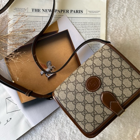 Interlocking G 塗層帆布翻蓋迷你馬鞍斜背包(棕色)