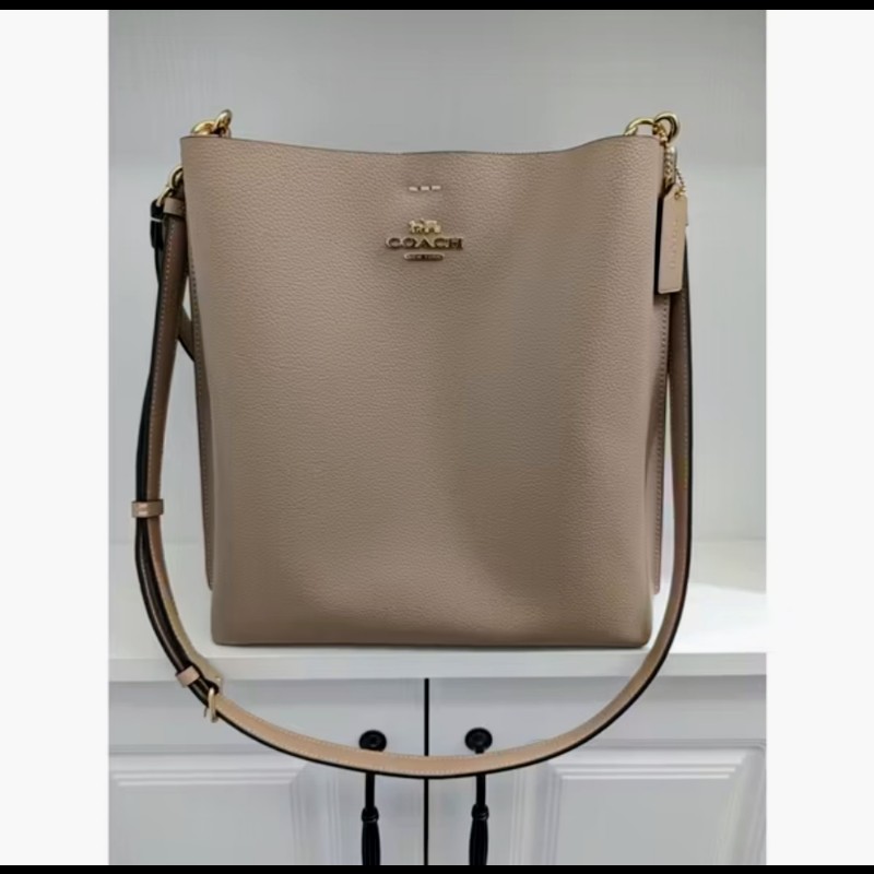 近全新 COACH 金馬車牛皮革手提/斜背水桶包 撞色 奶茶色 香檳色 經典 澳洲帶回 附吊牌-0
