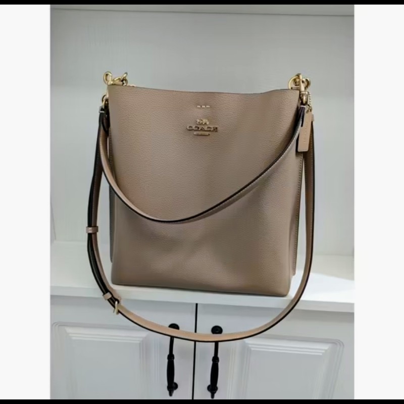 近全新 COACH 金馬車牛皮革手提/斜背水桶包 撞色 奶茶色 香檳色 經典 澳洲帶回 附吊牌-1