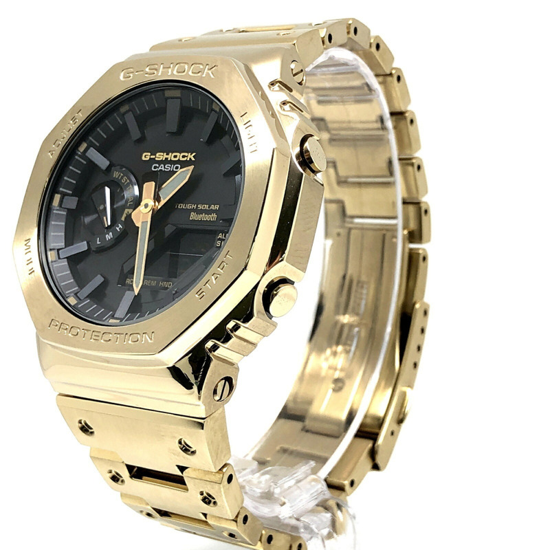 卡西歐 G-SHOCK GM-B2100GD-9A 全金屬金色 IP 太陽能腕錶，配備藍牙、手機連接、雙 LED 照明、八角形設計、橡木指針/數位雙顯。 2023 年 3 月發布。可在 Mikunigaoka 商店購買。-2