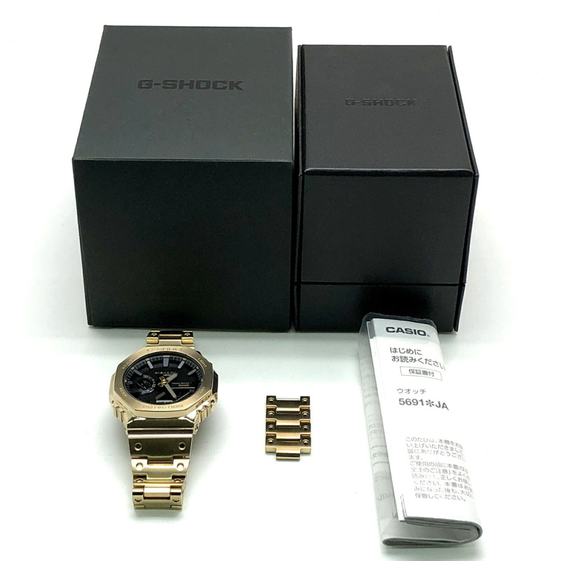 卡西歐 G-SHOCK GM-B2100GD-9A 全金屬金色 IP 太陽能腕錶，配備藍牙、手機連接、雙 LED 照明、八角形設計、橡木指針/數位雙顯。 2023 年 3 月發布。可在 Mikunigaoka 商店購買。-9