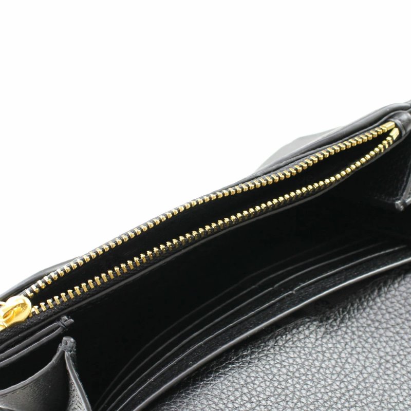 【TORY BURCH】素色荔枝皮革翻蓋斜背包-黑-1