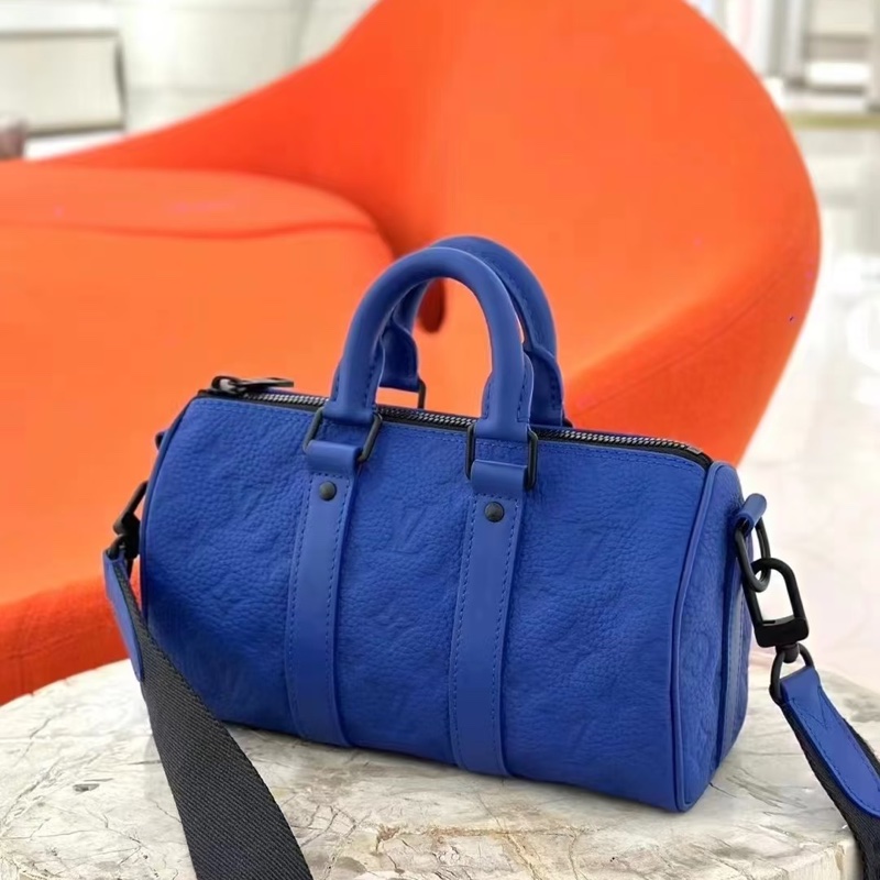 Louis Vuitton • Keepall Bandoulière 25 電光藍全皮壓紋-0