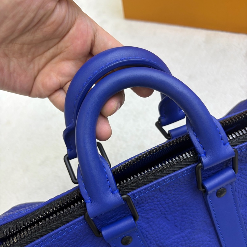 Louis Vuitton • Keepall Bandoulière 25 電光藍全皮壓紋-19