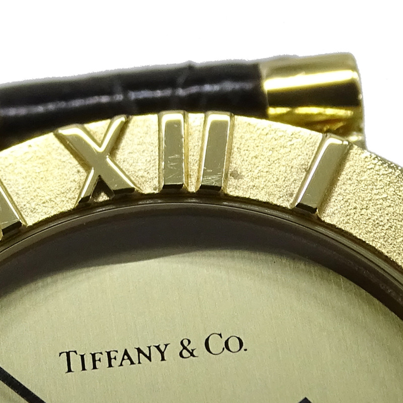 Tiffany & Co.) 女士 Atlas 石英腕錶，QZ 750YG，18K 金，黑色皮革錶帶，拋光，L0630-11