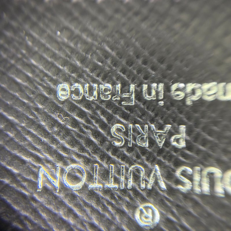 Louis Vuitton Taiga 長款對折皮夾-1