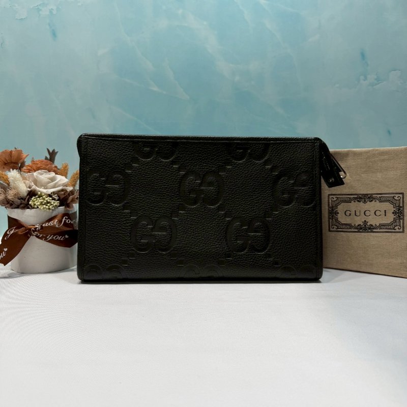 GUCCI JUMBO GG壓印拉鍊手拿包-0