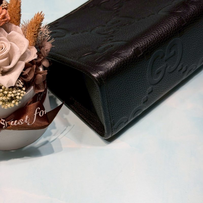 GUCCI JUMBO GG壓印拉鍊手拿包-7