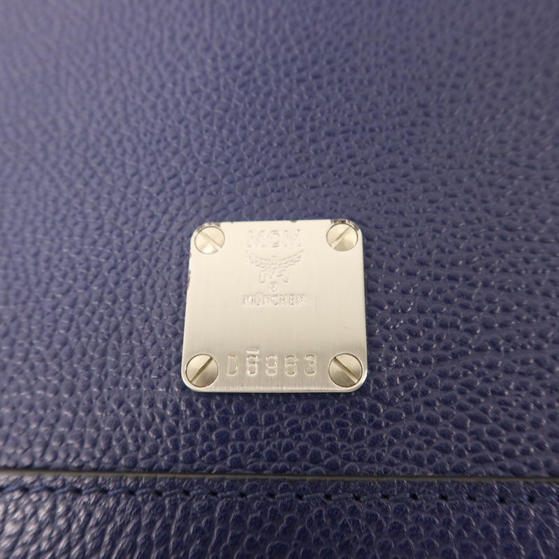 MCM 牛皮皮革Pouch銀扣手拿包-7