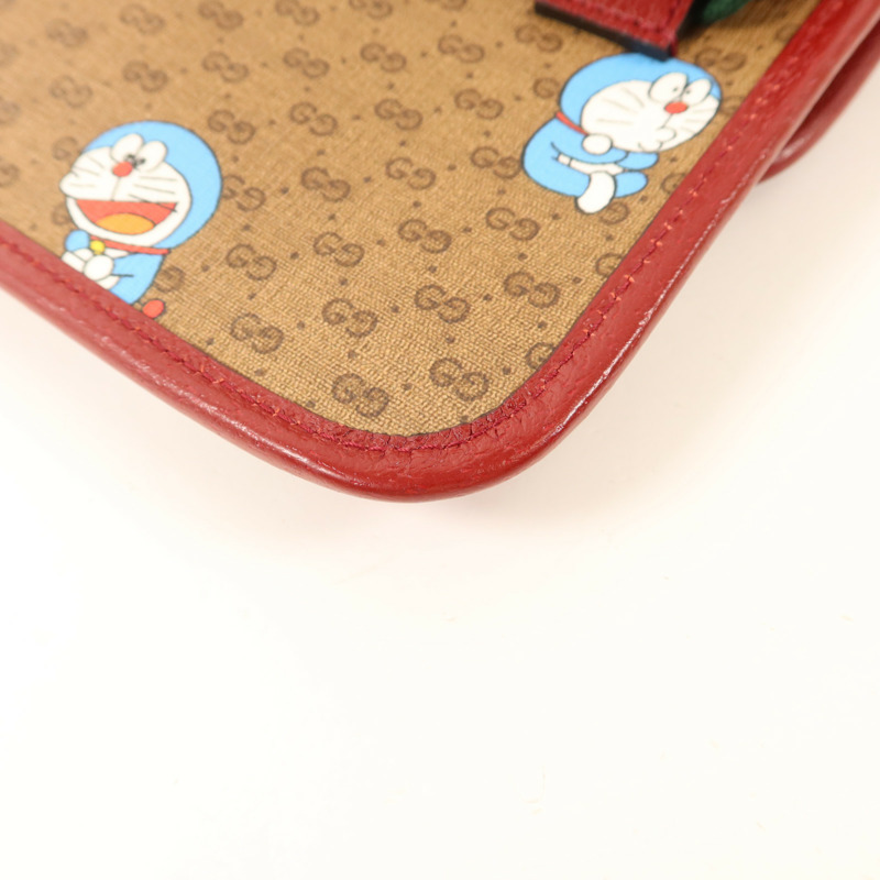 GUCCI 塗層帆布Doraemon X Gucci金扣腰包-13