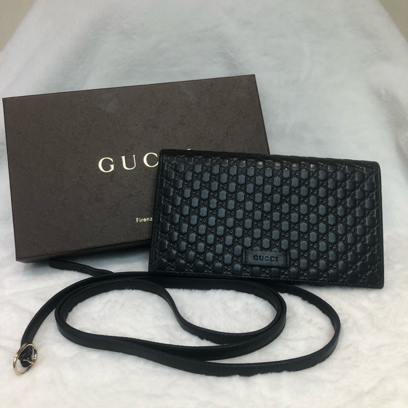 GUCCI 壓紋黑色牛皮細logo WOC XB724-0