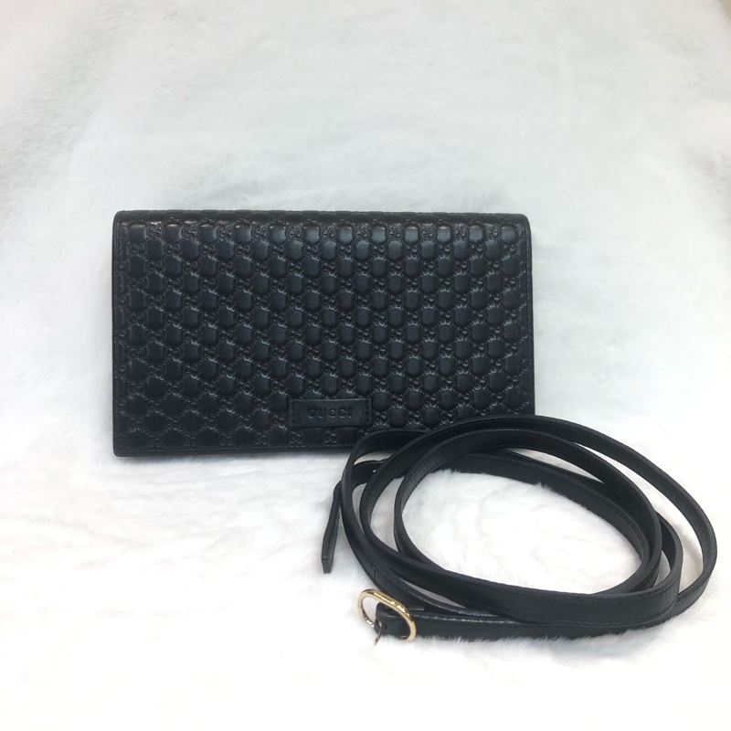 GUCCI 壓紋黑色牛皮細logo WOC XB724-5