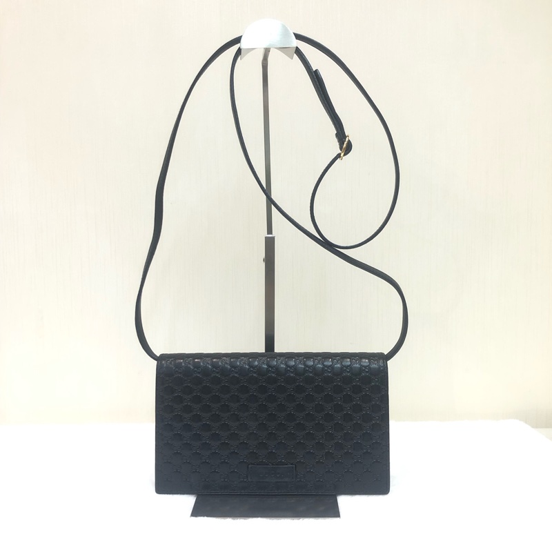 GUCCI 壓紋黑色牛皮細logo WOC XB724-7