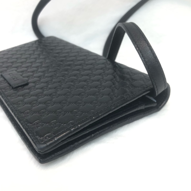 GUCCI 壓紋黑色牛皮細logo WOC XB724-11
