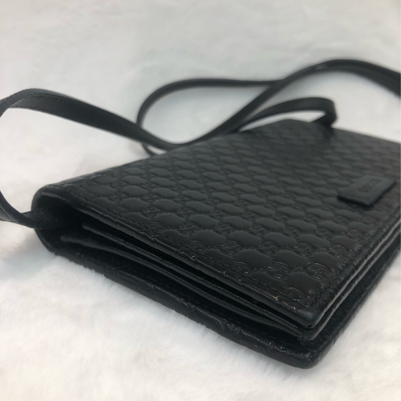 GUCCI 壓紋黑色牛皮細logo WOC XB724-12