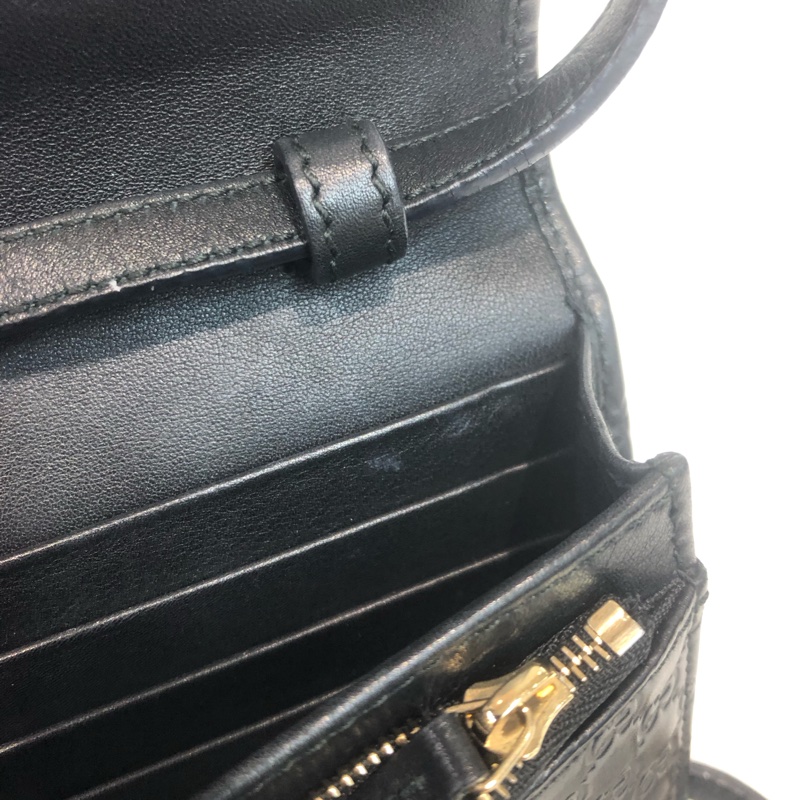 GUCCI 壓紋黑色牛皮細logo WOC XB724-20
