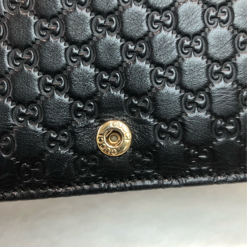 GUCCI 壓紋黑色牛皮細logo WOC XB724-27