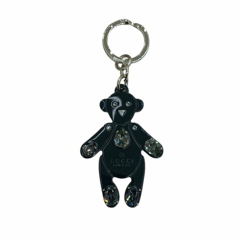GUCCI 古馳 395469 小熊掛飾 PVC 黑色 金釦