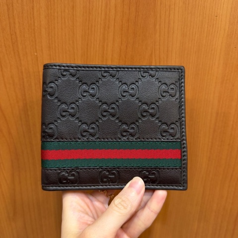 Gucci 咖牛皮GG壓紋對開短夾