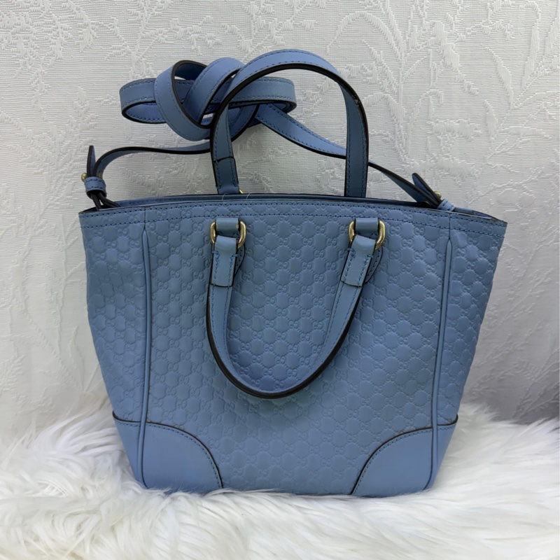 這款手袋是Gucci 的Microguccissima 皮革手提包。-0