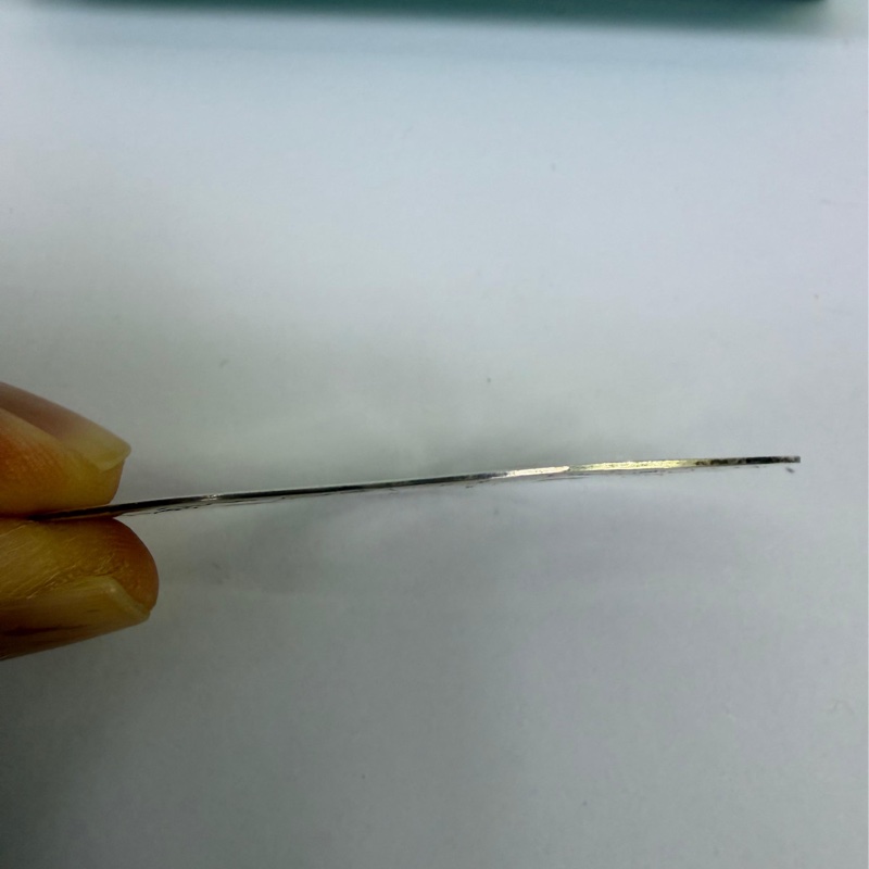 這款Tiffany & Co. 的產品為錢夾，通常由貴金屬製成。-2