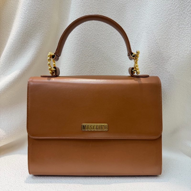 Moschino XO金屬釦棕色手提包 I889-0