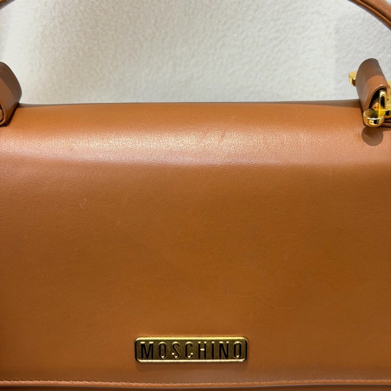 Moschino XO金屬釦棕色手提包 I889-8