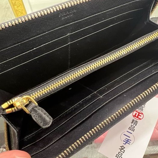 東區正精品㊣PRADA 1ML506 黑色防刮牛皮金字LOGOㄇ拉長夾 RA1555-10